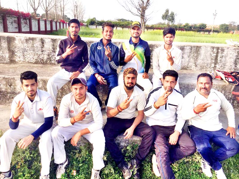 Skcc players posing for a group photograph after registering victory in friendly cricket match. Skcc players posing for a group photograph after registering victory in friendly cricket match.
