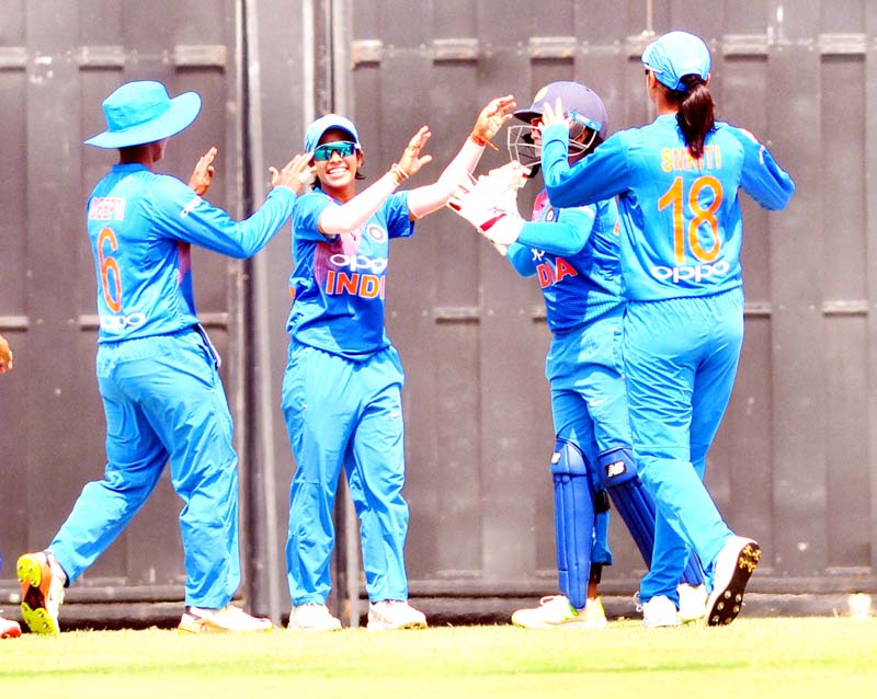 Indian players celebrating after dismissal of England's Tammy Beaumont during 3rd T20 match of womens cricket series against England at the Barsapara Cricket Stadium in Guwahati on Saturday. (UNI) Indian players celebrating after dismissal of England's Tammy Beaumont during 3rd T20 match of womens cricket series against England at the Barsapara Cricket Stadium in Guwahati on Saturday. (UNI)