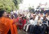 BJP State president, Ravinder Raina addressing an election meeting at R S Pura on Wednesday.