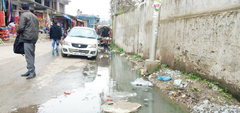 Dirty water of drain flowing on the road at Mendhar town. Excelsior/ Rahi Kapoor Dirty water of drain flowing on the road at Mendhar town. Excelsior/ Rahi Kapoor