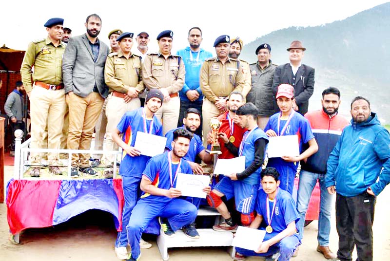 Winners of Volleyball tournament posing along with dignitaries and officials on Saturday. Winners of Volleyball tournament posing along with dignitaries and officials on Saturday.