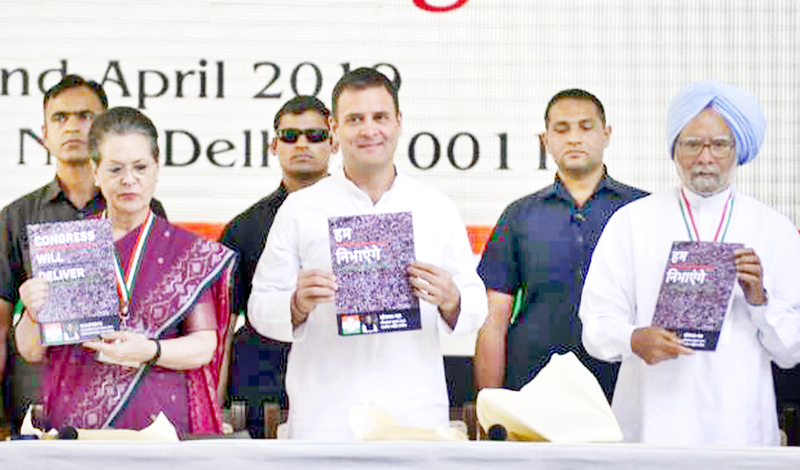 Congress leaders Sonia Gandhi, Rahul Gandhi and Dr Manmohan Singh releasing party manifesto in New Delhi on Tuesday. Congress leaders Sonia Gandhi, Rahul Gandhi and Dr Manmohan Singh releasing party manifesto in New Delhi on Tuesday.