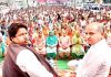 Senior Cong leader Raman Bhalla flanked by ex-DyCM Tara Chand at an election rally in Khour on Sunday.