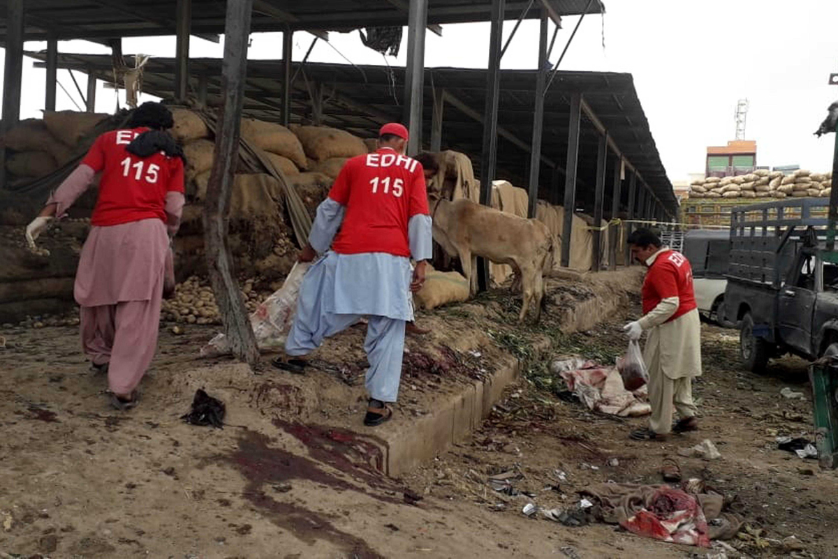 Rescuers inspecting the blast site in Quetta on Friday. Rescuers inspecting the blast site in Quetta on Friday.