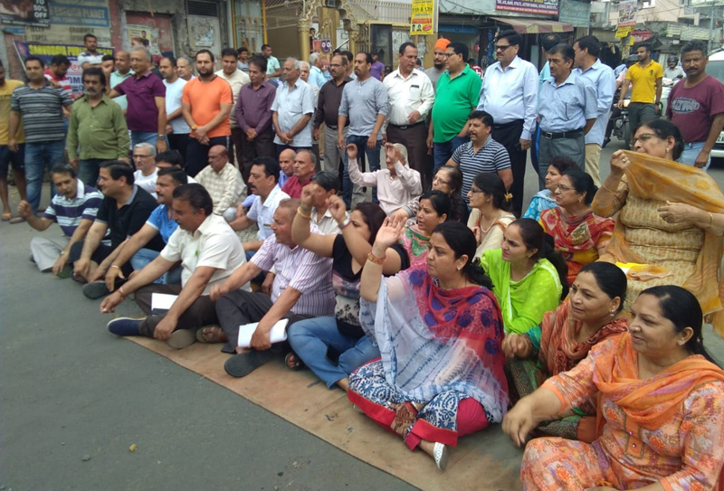 Locals of Tallab Tillo area in Jammu during a protest on Tuesday. Locals of Tallab Tillo area in Jammu during a protest on Tuesday.