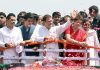 Congress President Rahul Gandhi with his sister and party's General Secretary Priyanka Gandhi Vadra waving supporters during a roadshow at Munshiganj on his way to file his nomination for the Amethi Parliamentary Constituency, in Amethi on Wednesday. (UNI)