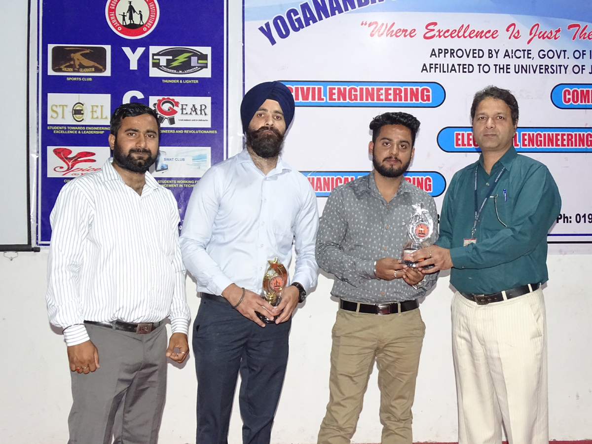 HoD presenting mementoes to the guests from Wipro who delivered lecture at YCET. HoD presenting mementoes to the guests from Wipro who delivered lecture at YCET.
