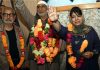 Congress district president Mohd Yousuf Bhat being welcomed in PDP by Mehbooba Mufti and Naeem Akhtar.