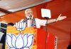 Prime Minister Narendra Modi addressing a public meeting at L B Stadium in Hyderabad on Monday. (UNI)