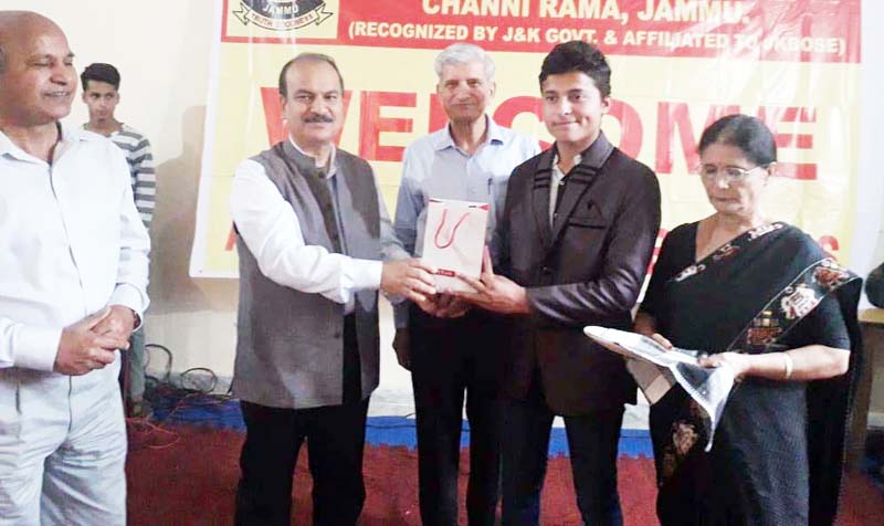 VC JU, Prof Manoj K. Dhar awarding a meritorious student of Balgran on Wednesday. VC JU, Prof Manoj K. Dhar awarding a meritorious student of Balgran on Wednesday.