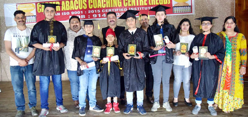 Meritorious students posing during annual function organised by Career Abacus Coaching Centre in Jammu. Meritorious students posing during annual function organised by Career Abacus Coaching Centre in Jammu.