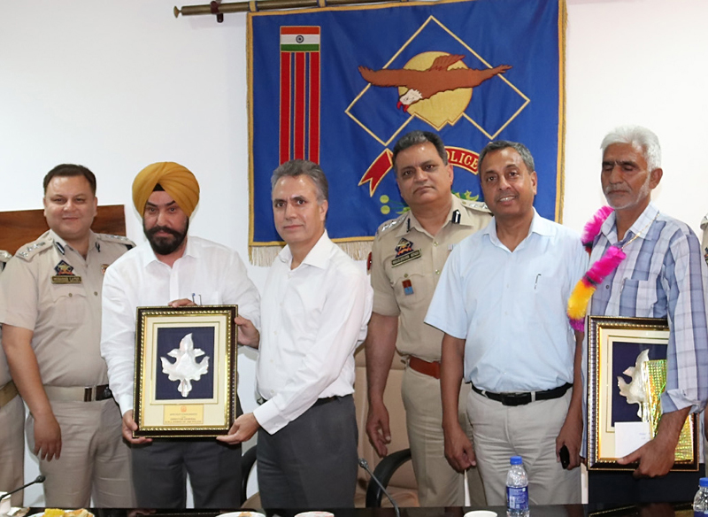 Retiring officials being accorded farewell. Retiring officials being accorded farewell.