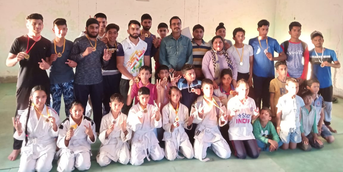 Meritorious Judoka posing for a group photograph during felicitation function in Jammu. Meritorious Judoka posing for a group photograph during felicitation function in Jammu.