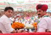 Senior Cong leaders Jyotiraditya Scindia and Vikramaditya Singh at an election rally in Billawar on Sunday.