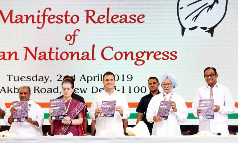 Congress President Rahul Gandhi with UPA Chairperson Sonia Gandhi, Former Prime Minister Manmohan Singh, Senior party leaders A K Antony, P Chidambaram, K C Venugopal and others releasing the party's Manifesto for the General Elections -2019, at AICC headquarters, in New Delhi on Tuesday. (UNI) Congress President Rahul Gandhi with UPA Chairperson Sonia Gandhi, Former Prime Minister Manmohan Singh, Senior party leaders A K Antony, P Chidambaram, K C Venugopal and others releasing the party's Manifesto for the General Elections -2019, at AICC headquarters, in New Delhi on Tuesday. (UNI)