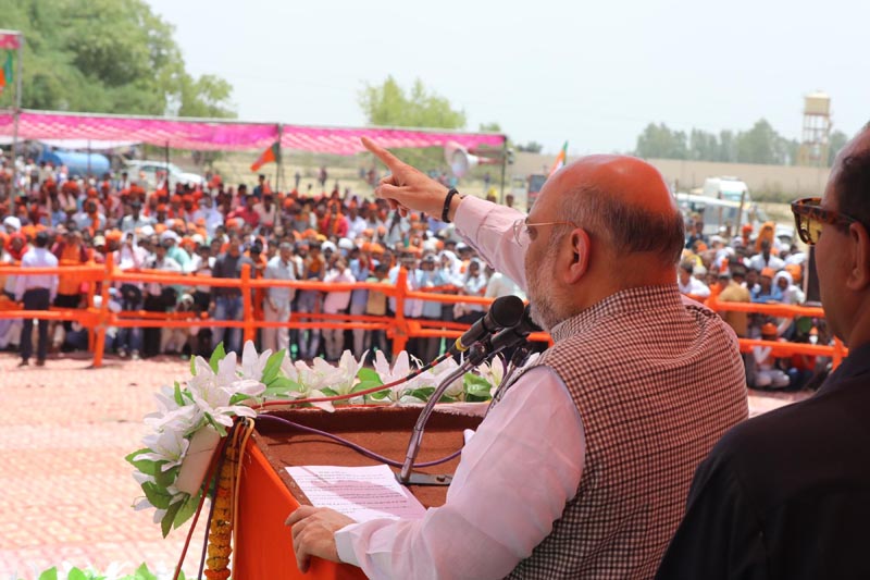 Congress President Rahul Gandhi addressing a public meeting at Unchahar in Raebareli district on Saturday. (UNI) Congress President Rahul Gandhi addressing a public meeting at Unchahar in Raebareli district on Saturday. (UNI)