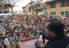 Sajjad Lone addressing a workers meeting in Kupwara on Tuesday.