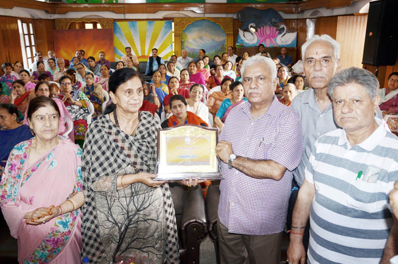 K K Khosa, president K P Sabha presenting a memento to Bimla Raina at a function at Jammu on Monday. K K Khosa, president K P Sabha presenting a memento to Bimla Raina at a function at Jammu on Monday.