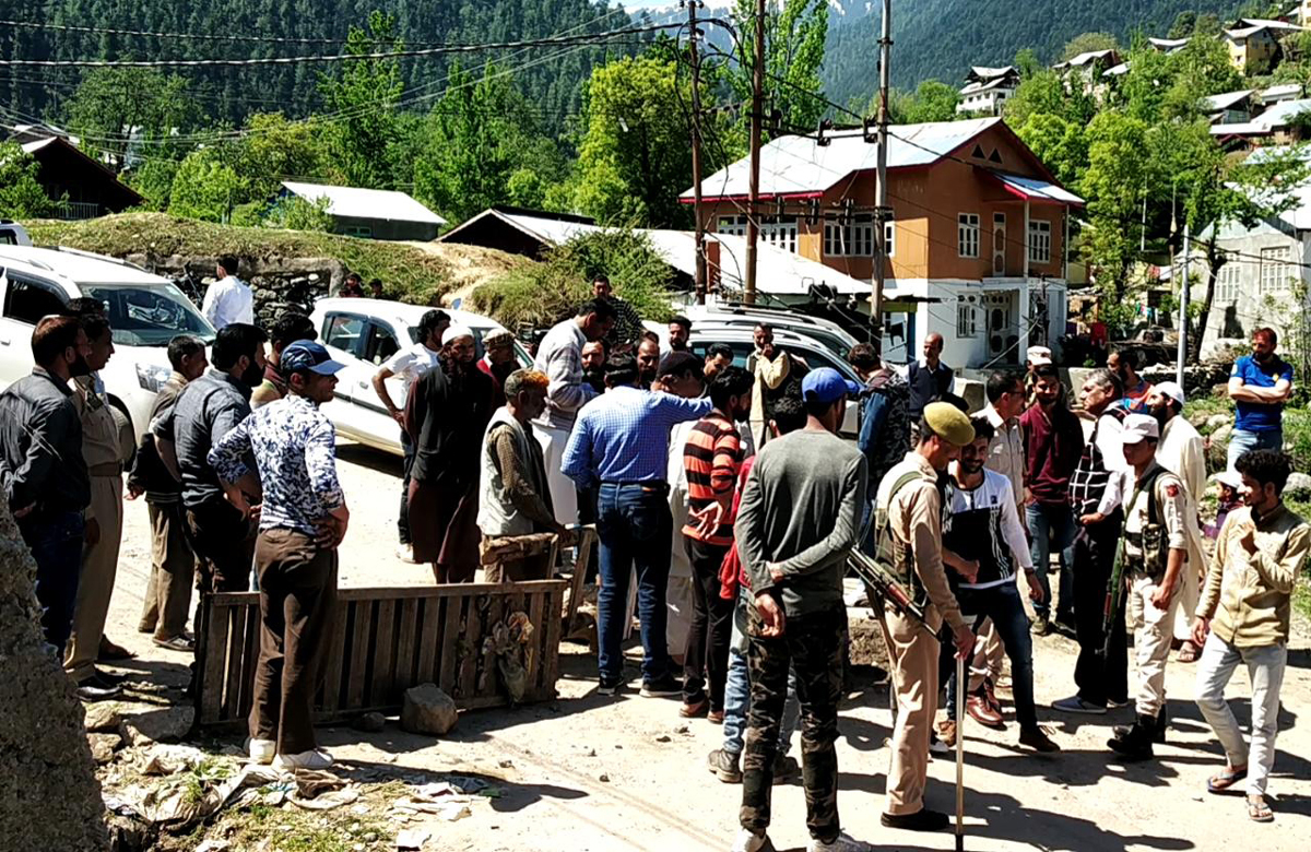 Farmers block Bhaderwah-Sartingal road demanding repair of damaged canal on Monday. Farmers block Bhaderwah-Sartingal road demanding repair of damaged canal on Monday.