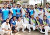 Players posing for a group photograph after an exhibition match between JU and Media XI on Sunday.