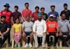 Winners of opening tie of the Spirit of Sports Cricket Series posing for a group photograph at Country Cricket Stadium, Gharota in Jammu.