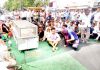 People protesting with dead body at main market of Khour town on outskirts of Jammu.