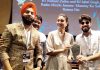 RJ Nishant Zadoo and RJ Iqbal Singh of Radio Mirchi Jammu receiving award from actress Kareena Kapoor Khan at Mumbai.