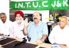 State unit president of INTUC, Shiv Kumar Sharma, speaking at Raising Day function of the organization in Jammu on Friday. -Excelsior/Rakesh