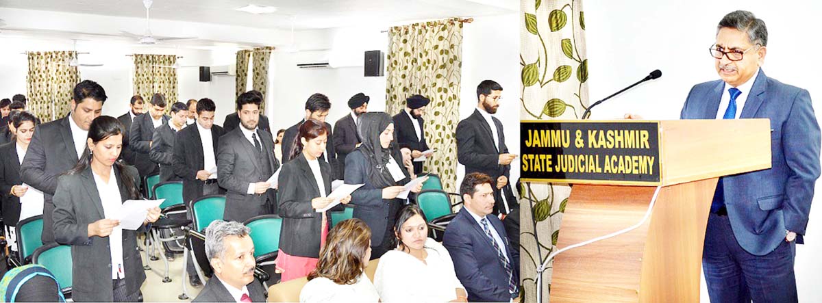 Justice Sanjeev Kumar administering oath to newly enrolled advocates. Justice Sanjeev Kumar administering oath to newly enrolled advocates.