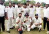 Players of Royal Warrior Cricket Club posing for a group photograph along with officials in Jammu on Thursday.