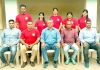 Selected State power-lifting team posing along with dignitaries before leaving for Tokyo, Japan.