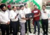 Officials of Action Tesa presenting gift to a contractor at Udhampur.