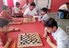 Players in action during Inter-School Chess competition at Sports Stadium in Kathua.