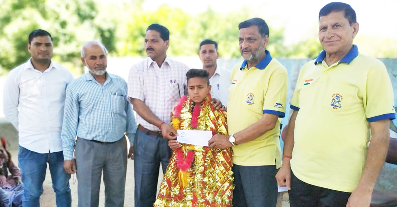 Young Wrestler Ashok Singh being honoured in Reasi. Young Wrestler Ashok Singh being honoured in Reasi.