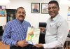 Union Minister Dr Jitendra Singh being presented souvenir book on "Clean Election Campaign", at New Delhi on Thursday.