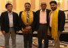 Sanjay Aggarwal, MD and Kanav Aggarwal, CEO of Jammu Motors posing with RC Bhargava Chairman and Kenichi Ayukawa (MD and CEO of Maruti Suzuki India Limited).