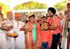 A group of pilgrims initiating free Langar of Shrine Board at Tarakote in the presence of CEO Simrandeep Singh.