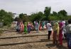 Border residents protesting on railway track at Ghagwal on Thursday.
