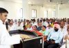 Ex-MP Madan Lal Sharma addressing Cong workers' meeting at Maira Mandrian in Akhnoor on Sunday.