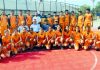 J&K Basketball teams posing along with dignitaries and officials before leaving for nationals.