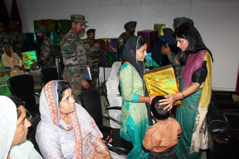 A senior Army officer's wife felicitating a ‘Veer Nari' during camp at Akhnoor on Sunday. A senior Army officer's wife felicitating a ‘Veer Nari' during camp at Akhnoor on Sunday.