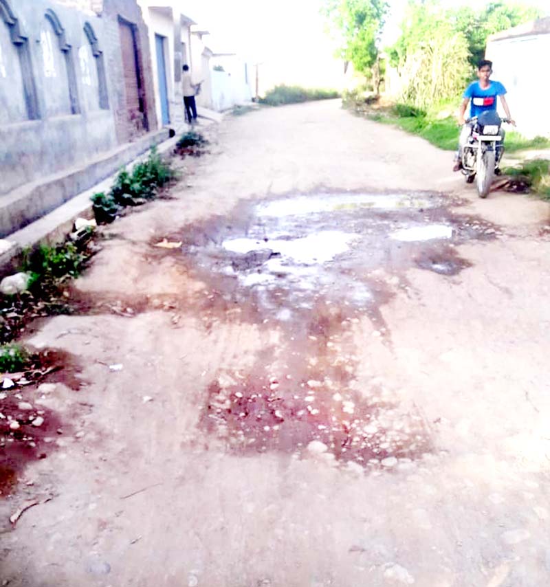 Surechak - Chak Jogi road with big potholes. Surechak - Chak Jogi road with big potholes.