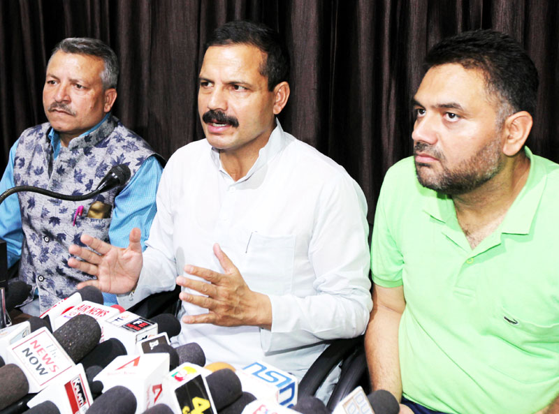 Balwant Singh Mankotia addressing a press conference at Jammu on Friday. -Excelsior/Rakesh
