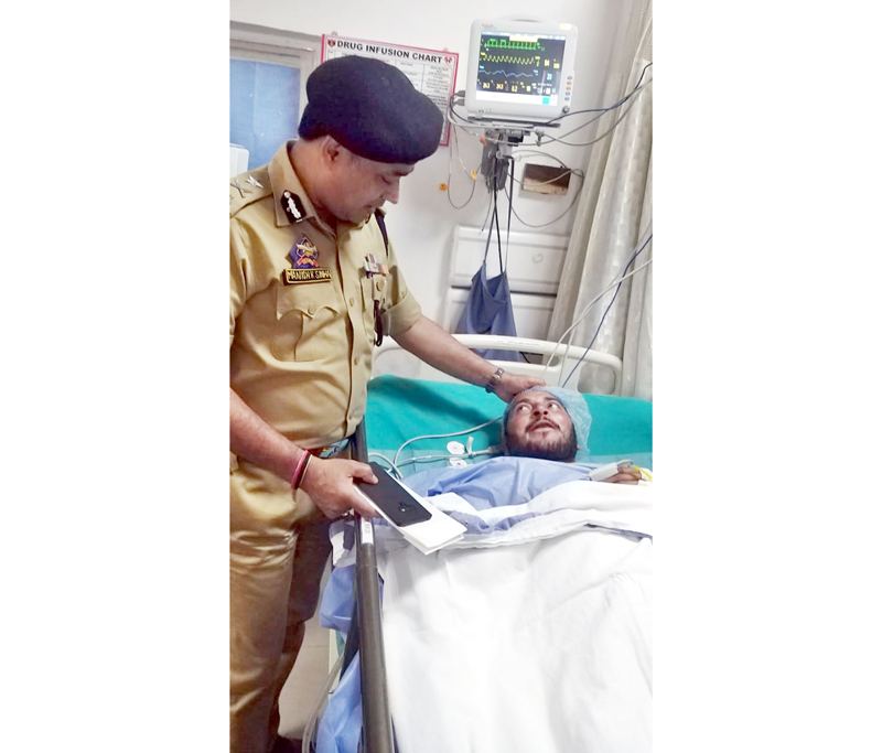 IGP Jammu M K Sinha enquiring condition of an injured SPO in Military Hospital Udhampur on Friday.