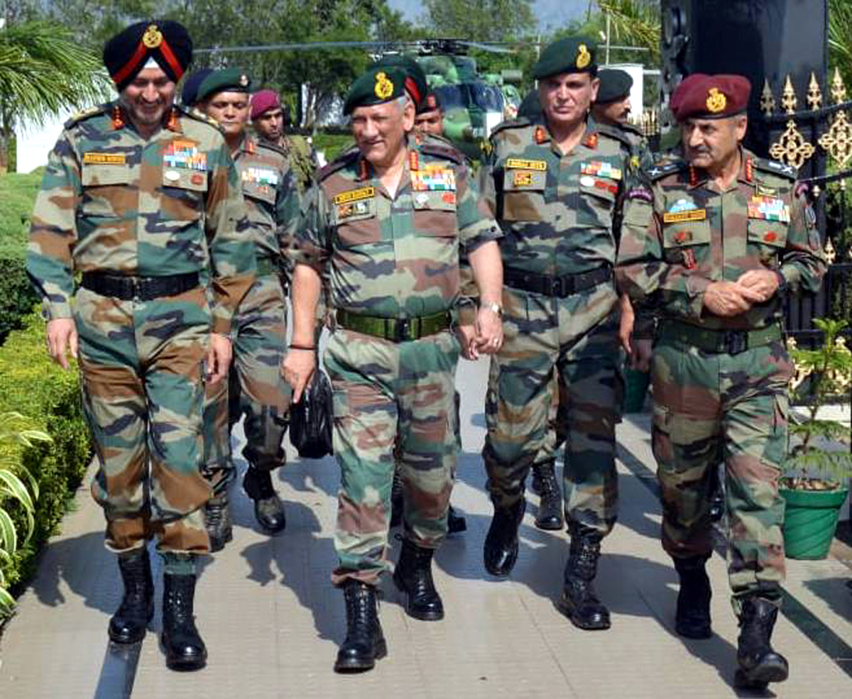 Army chief Gen Bipin Rawat with Northern Command Army Commander Lt Gen Ranbir Singh and GOC White Knight Corps Lt Gen Paramjit Singh in Jammu on Tuesday. (UNI)