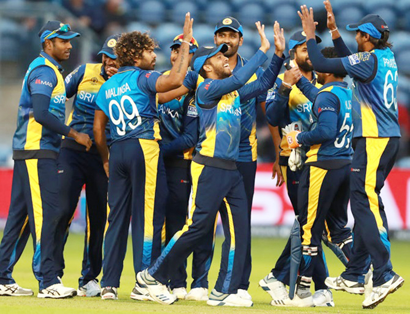 Sri Lankan players celebrating victory against Afghanistan in World Cup at Cardiff on Tuesday. Sri Lankan players celebrating victory against Afghanistan in World Cup at Cardiff on Tuesday.