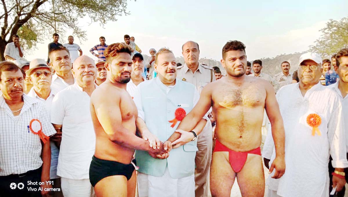 Wrestlers posing along with Provincial President National Conference Devender Singh Rana and other dignitaries at Aithem, Nagrota in Jammu. Wrestlers posing along with Provincial President National Conference Devender Singh Rana and other dignitaries at Aithem, Nagrota in Jammu.