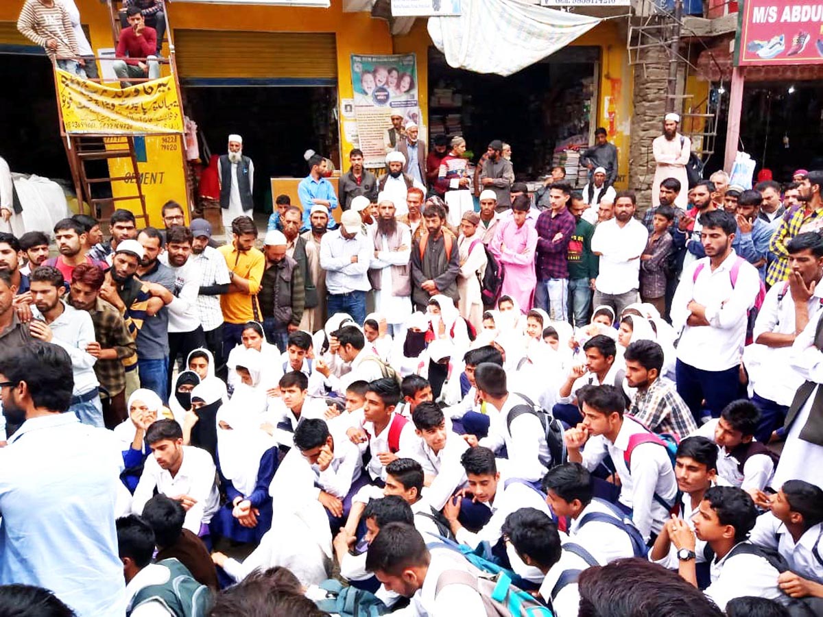 Students blocking Gandoh-Doda-Thathri road at Kahara on Monday. Students blocking Gandoh-Doda-Thathri road at Kahara on Monday.