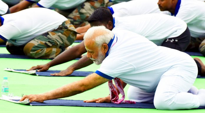 Prime Minister Narendra Modi performing Yoga Asana during the 5th International Yoga Day in Ranchi on Friday. (UNI)