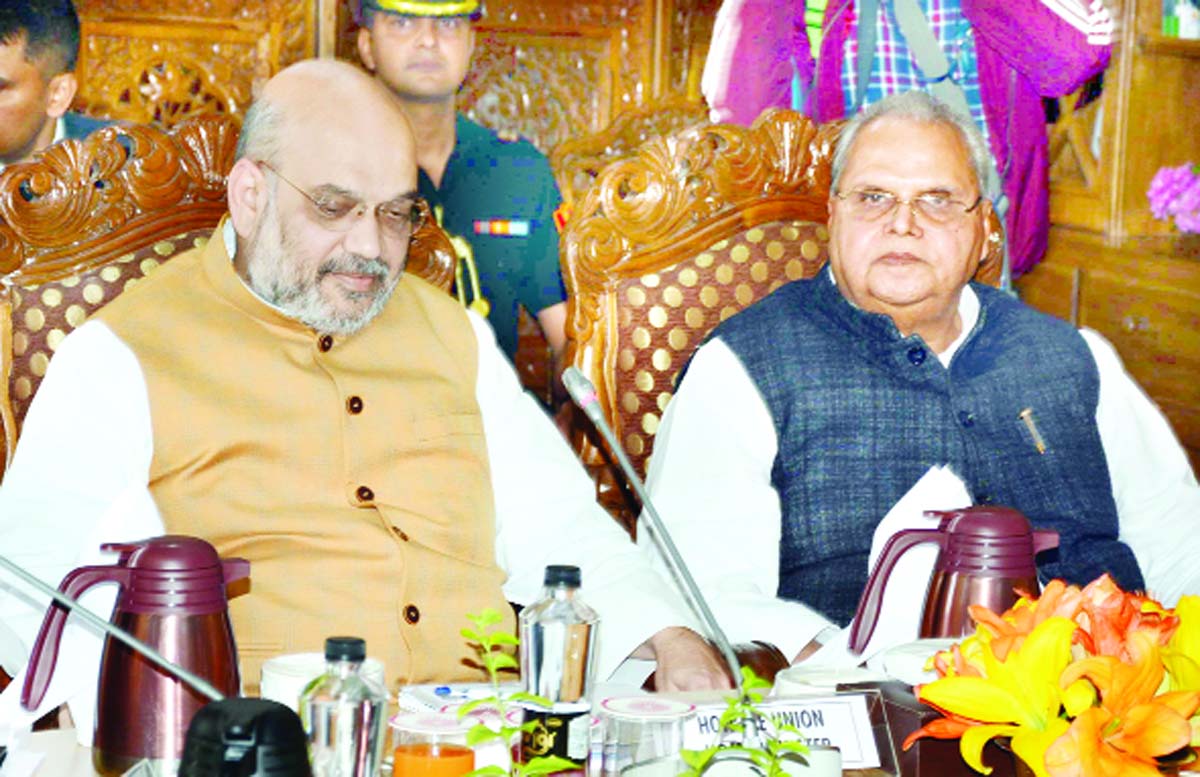 Union Home Minister Amit Shah and Governor Satya Pal Malik at development review meeting in Srinagar on Wednesday.
